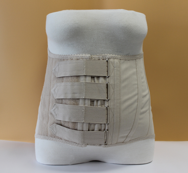 Vorderansicht eines Stützmieders nach Schanz Vorderansicht eines Stützmieders nach Schanz mit vertikal verlaufenden Metallverstärkungsstäben